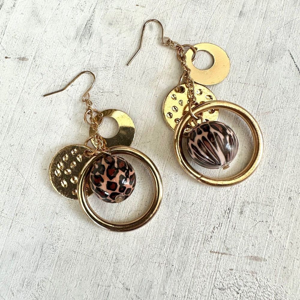 Gold tone charm drop earrings